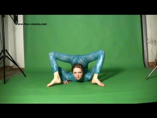 tatiana circus performer shows a warm-up for flexibility and stretching